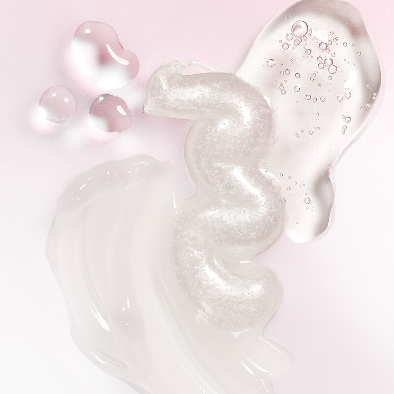 Product rubs of the products included in the Mary Kay Skin Care Mattifying Go Set against light pink background image number null