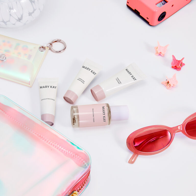Mary Kay Skin Care Mattifying Go Set styled with pink lifestyle accessories image number null