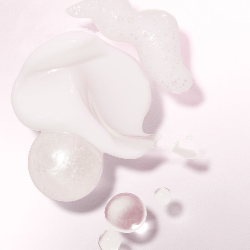 Product rubs of the products included in the Mary Kay Skin Care Hydrating Go Set against light pink background image number null
