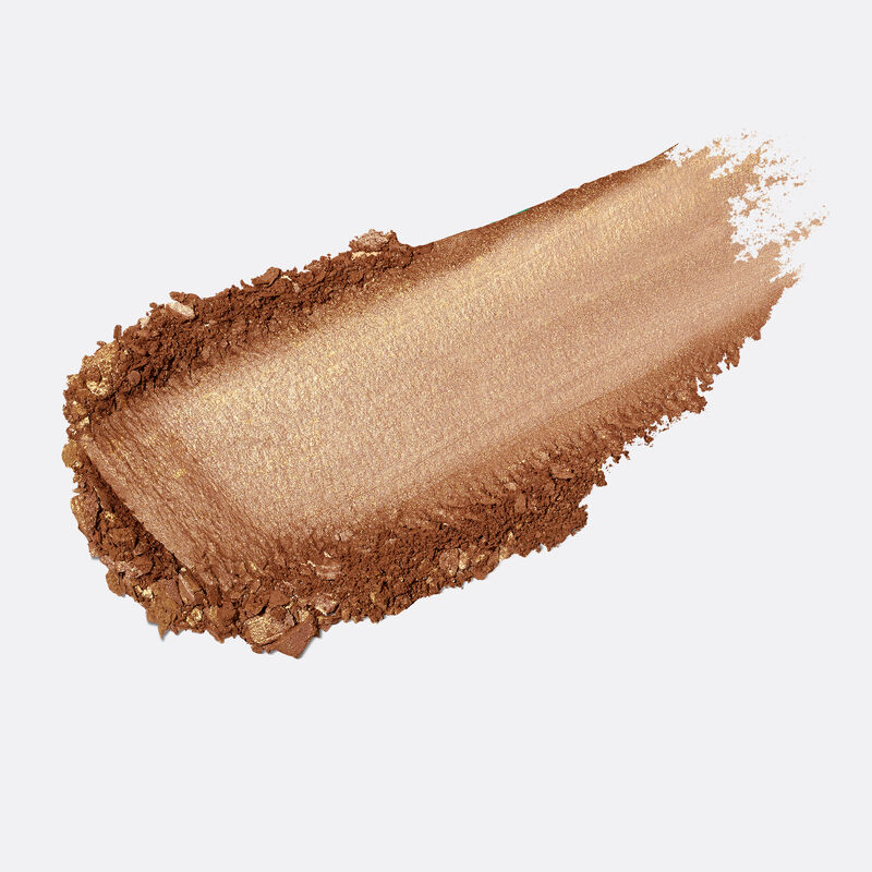 Product rub of limited-edition Mary Kay Illuminating Bronzer in shade Deep Glow against plain background image number null