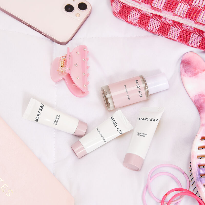 Mary Kay Skin Care Hydrating Go Set styled with pink lifestyle accessories image number null