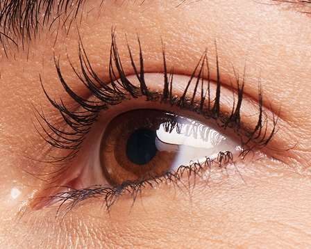 Woman with one coat of Mary Kay Fanorama Mascara