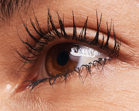 Woman with three coats of Mary Kay Fanorama Mascara