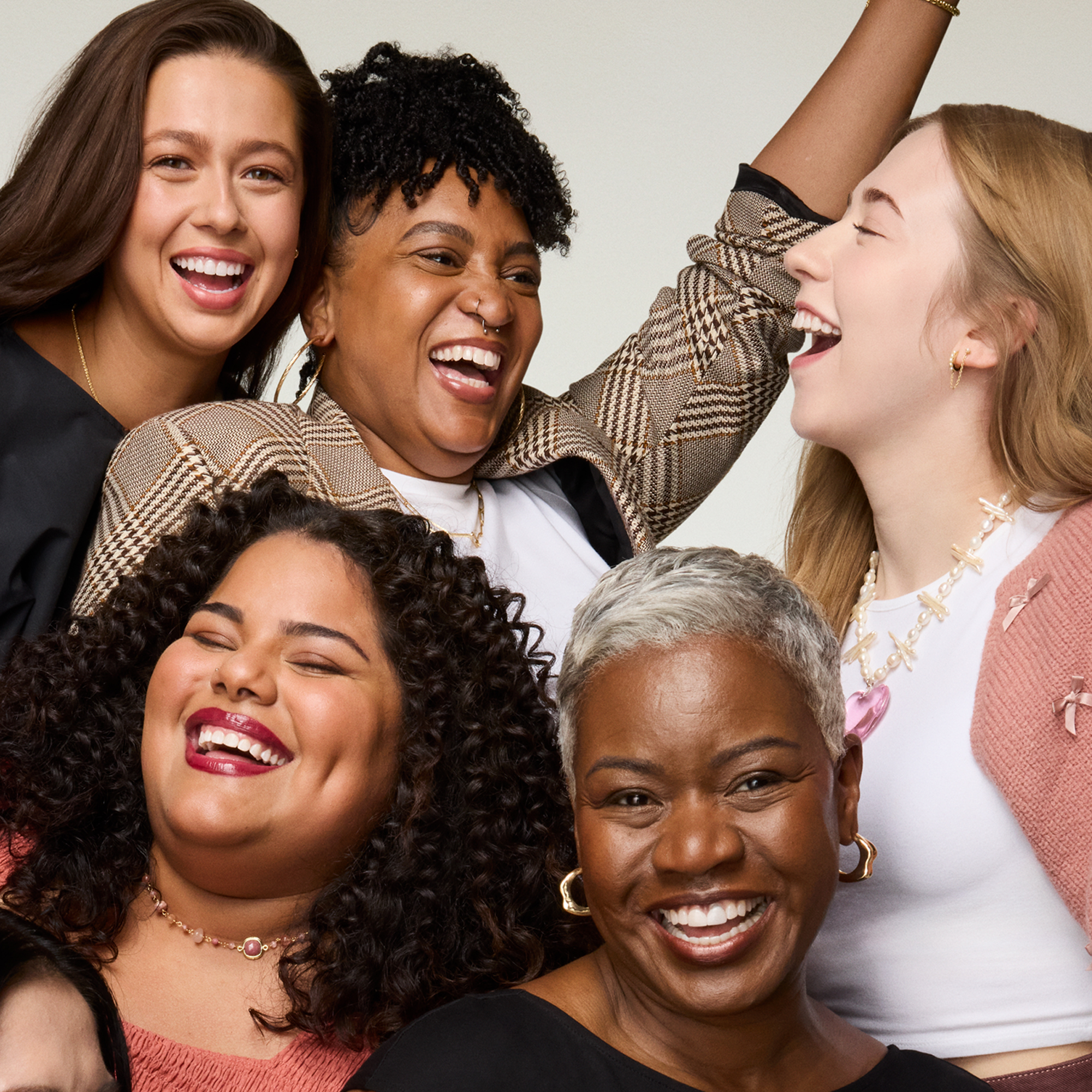 Group of 4 women laughing